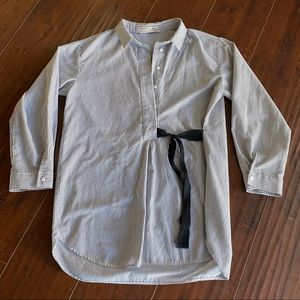 Striped shirt with a black tie